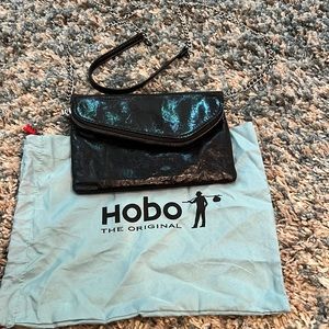 Hobo black crossbody with chain.